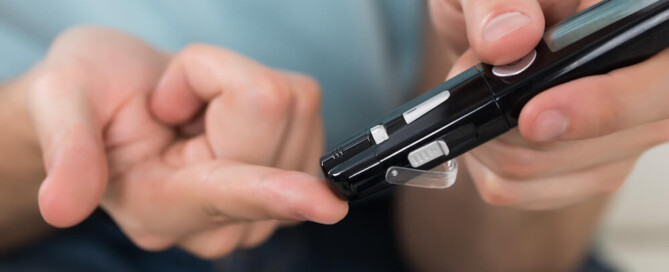 rely on glucose - person testing glucose levels on finger