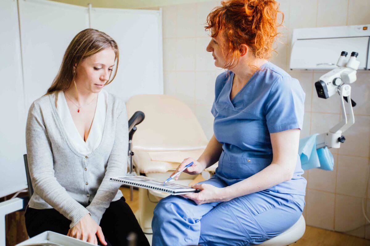 strategic approach woman consulting with doctor
